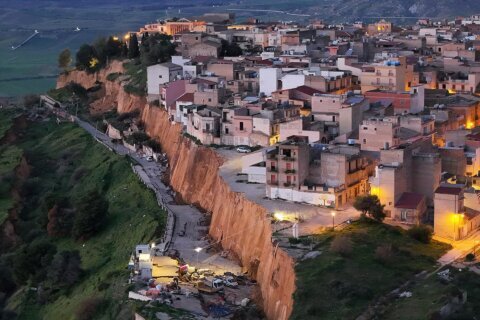 Huge landslide leaves Sicilian homes teetering on cliff edge as 1,500 people are evacuated