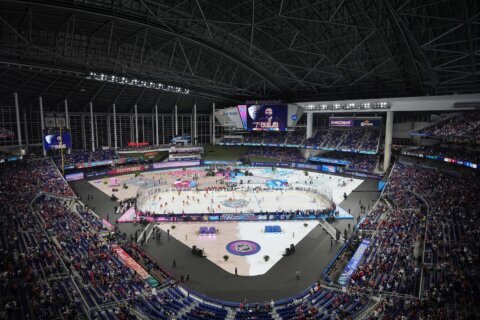 Panthers and Rangers play outdoor hockey game in Miami, replete with snow and fire