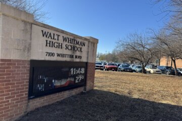 sign reading walt whitman high school