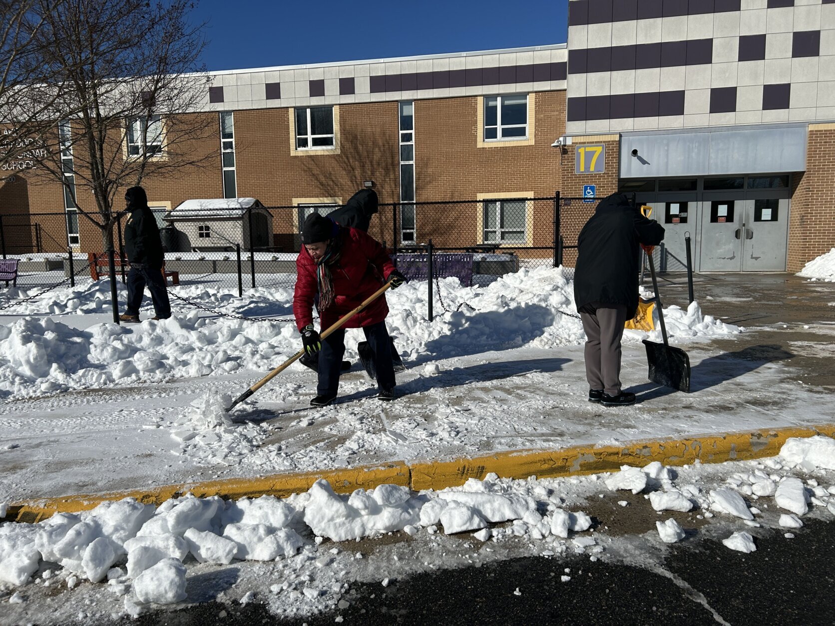 crew shoveling snow