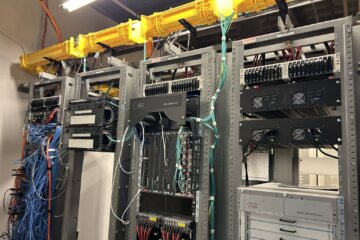 room full of wires and servers and technology