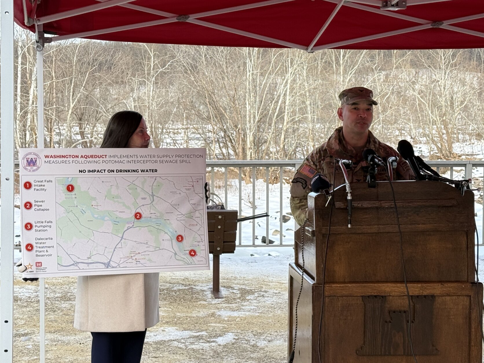 Two people talking about the Potomac River sewage spill