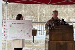 Two people talking about the Potomac River sewage spill