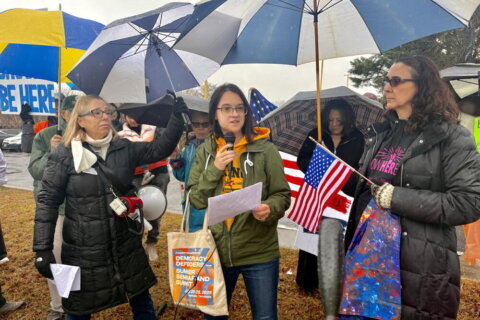 ‘Eventually we will all be targeted’: ICE protests in Montgomery Co. remember Renee Good