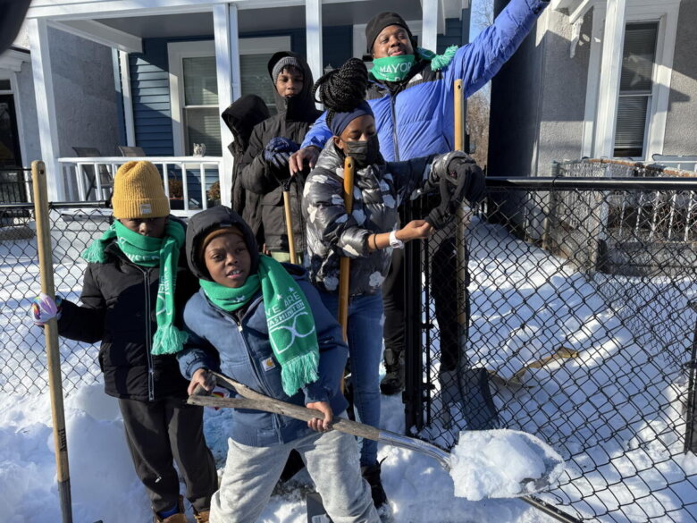 Young Snow Team Heroes dig out seniors trapped behind icy sidewalks in DC