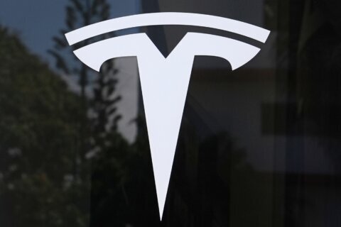 Tesla loses title as world’s biggest electric vehicle maker as sales fall for second year in a row