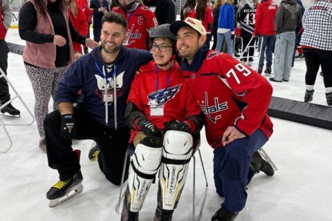 ‘It was surreal’: Caps players invite kids with disabilities onto the ice after practice