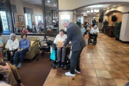 Tombot took Jennie into the real world for hands-on demonstrations at senior living communities.