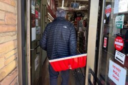 customer carries a shovel