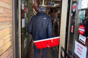customer carries a shovel