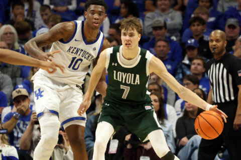 Loyola (MD) hosts Holy Cross after Disu’s 20-point performance