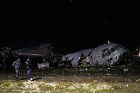 Cargo plane carrying money crashes near Bolivia’s capital, killing at least 15 people, official says
