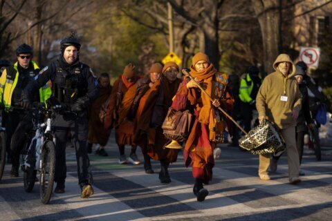 Buddhist monks’ 15-week walk for peace ends in Washington, DC