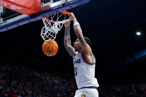No. 9 Kansas beats top-ranked and previously undefeated Arizona 82-78