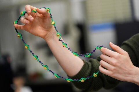 Biodegradable Mardi Gras beads help make Carnival season more sustainable