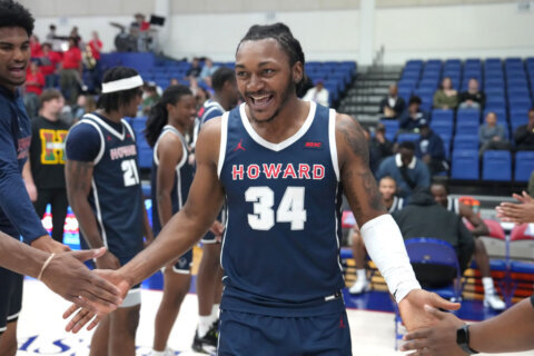 Taylor, Harris both score 17 to help Howard cruise past Delaware State 91-59