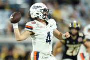 JACKSONVILLE, FLORIDA - DECEMBER 27: Chandler Morris #4 of the Virginia Cavaliers looks for a pass in the second quarter of the 2025 TaxSlayer Gator Bowl between the Missouri Tigers and Virginia Cavaliers at EverBank Stadium on December 27, 2025 in Jacksonville, Florida. (Photo by Dustin Markland/Getty Images)
