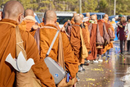 <p>Buddhist monks participate in a “Walk for Peace” in Glen Allen, Virginia, on Feb. 3, 2026. The group is walking from Fort Worth, Texas, to Washington, DC to promote peace, compassion and nonviolence. (Photo by Aaron Mathes / AFP via Getty Images)</p>
