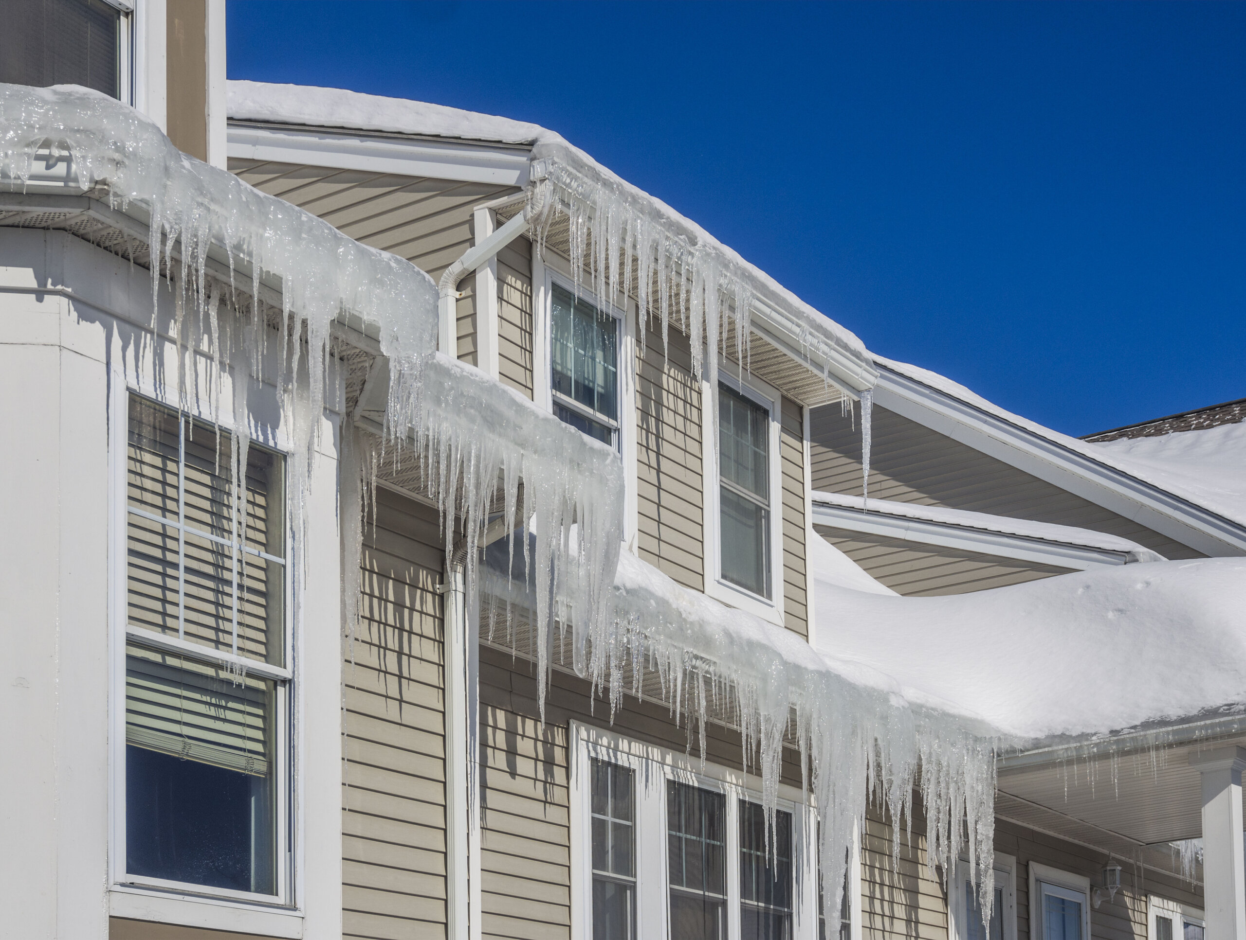 When to take action to clear ice and snow from your home’s roof