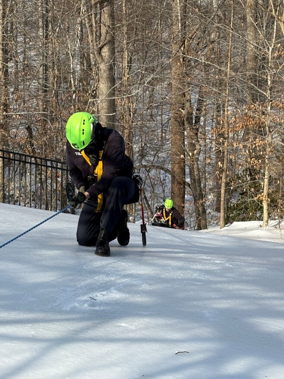 Prince William County's Fire and Rescue crew using ropes for a weather-related call for assistance.