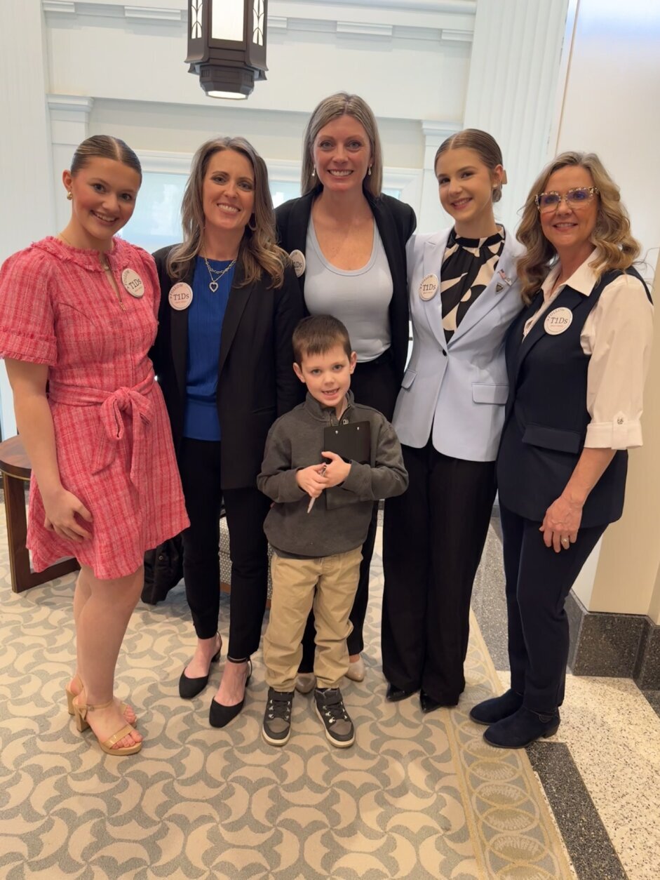 Ruston and his mom Kelly (middle) have joined other advocates in Richmond to press legislators to pass the bill