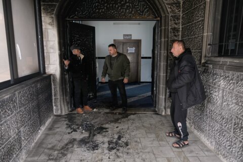 Israeli settlers torch and deface a West Bank mosque as Ramadan begins