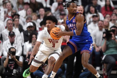 Peterson finally finishes for No. 11 Kansas, hitting two late 3s to beat No. 13 Texas Tech