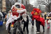 Lion dancers perform in parade