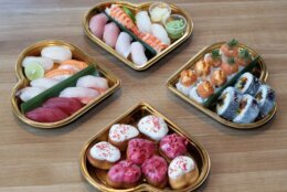 sushi in heart-shaped boxes