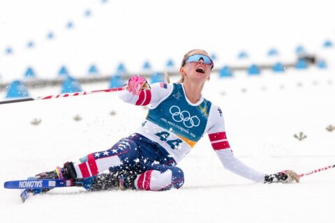 Jessie Diggins fights injury to take bronze in race dominated by Sweden at Milan Cortina Games
