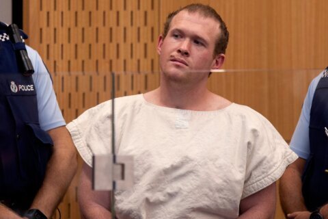 New Zealand mosque shooter seeks to discard his guilty pleas, saying prison made him irrational
