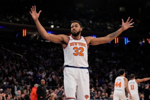 Knicks outlast Nuggets 134-127 in 2 OTs for their eighth straight victory as Brunson scores 42
