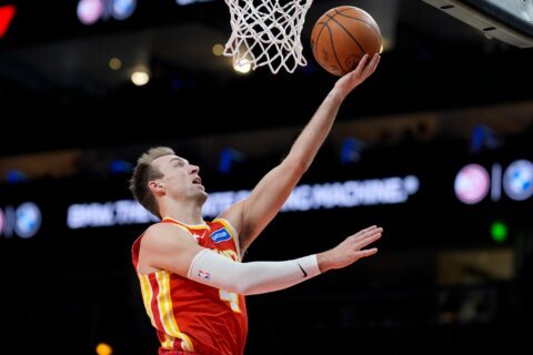 Lakers acquire 3-point shooter Kennard from busy Hawks for point guard Vincent, AP source says