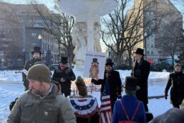 crowd gathers to hear potomac phil's weather prediction in dupont circle