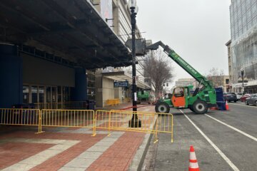 a telehandler outside a DC building