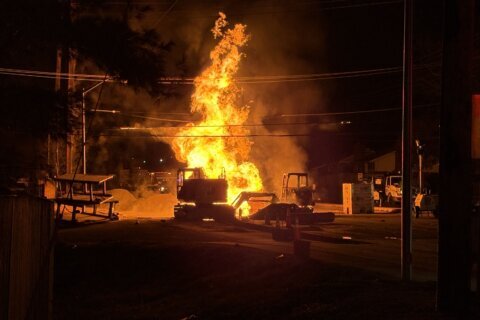 Gas explosion in Calverton sends 1 to hospital, brings down power line