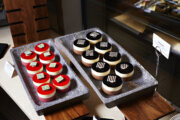 desserts on trays at a buffet
