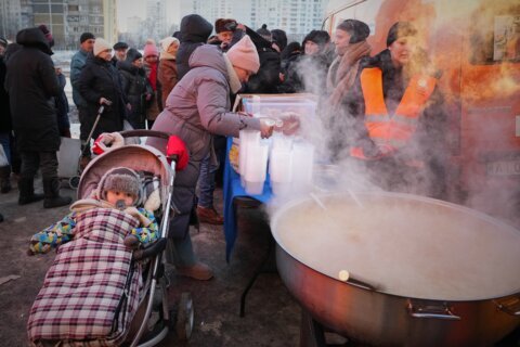 In the Ukrainian capital, a mother struggles to keep her children warm and fed amid power outages