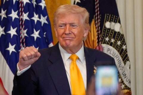 Trump visits Georgia, a target of his election falsehoods, as Republicans look for midterm boost