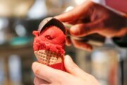 An employee fills an ice cream cone at the Häagen-Dazs shop opening in Sylt, Germany in 2015.