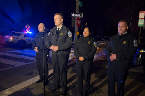 police speak at a news conference