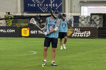 lacrosse player with stick
