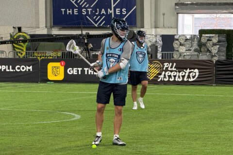 lacrosse player with stick