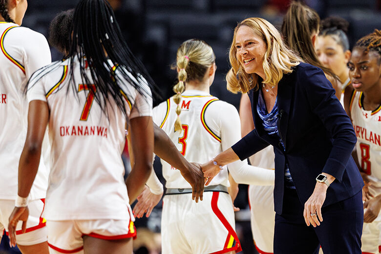 coach supports player