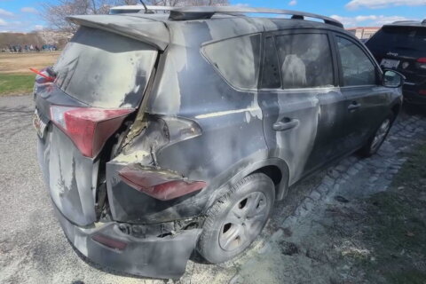 Car set on fire near Washington Monument, temporarily shutting down operations