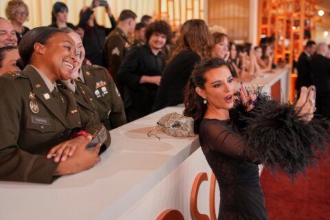 See photos of stars arriving for the Oscars