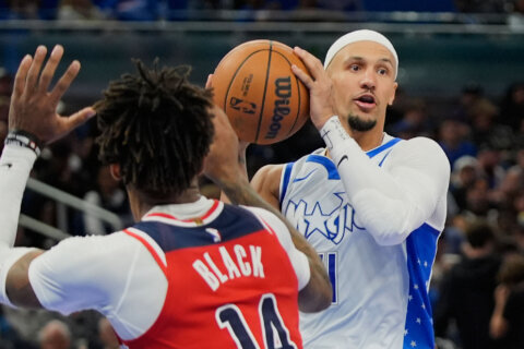 Suggs helps Magic overcome Coulibaly and the Wizards in OT for their 6th straight win