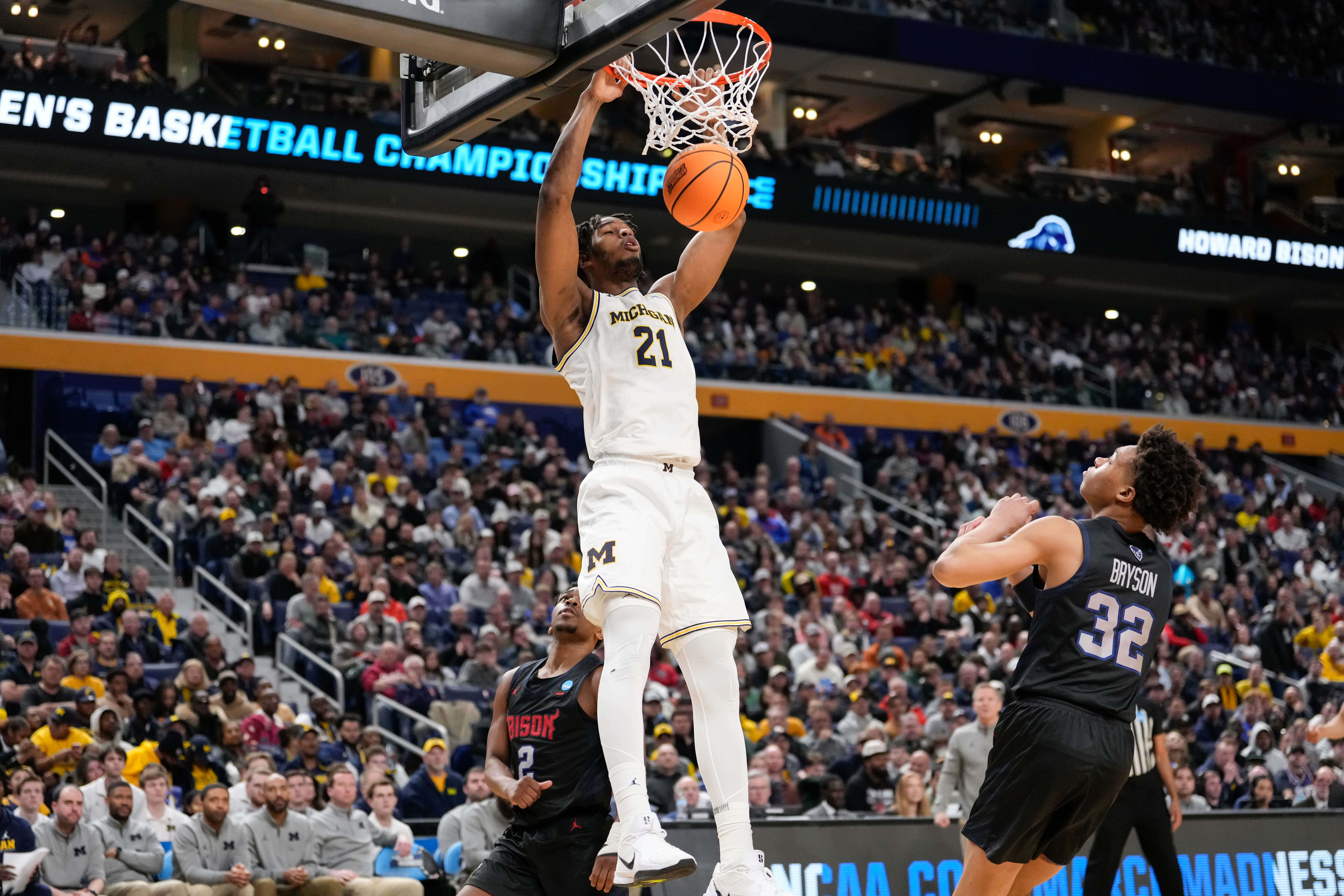 Morez Johnson Jr. and top-seeded Michigan roll past Howard 101-81 in March Madness after slow start