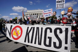 Demonstrators rally in front of the Lincoln Memorial during the No Kings protest in Washington, Saturday, March 28, 2026. (AP Photo/Jose Luis Magana)
