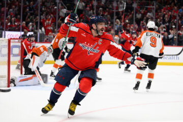 Washington Capitals left wing Alex Ovechkin (8) celebrates his goal during the first period of an NHL hockey game against the Philadelphia Flyers, Tuesday, March 31, 2026, in Washington. (AP Photo/Nick Wass)